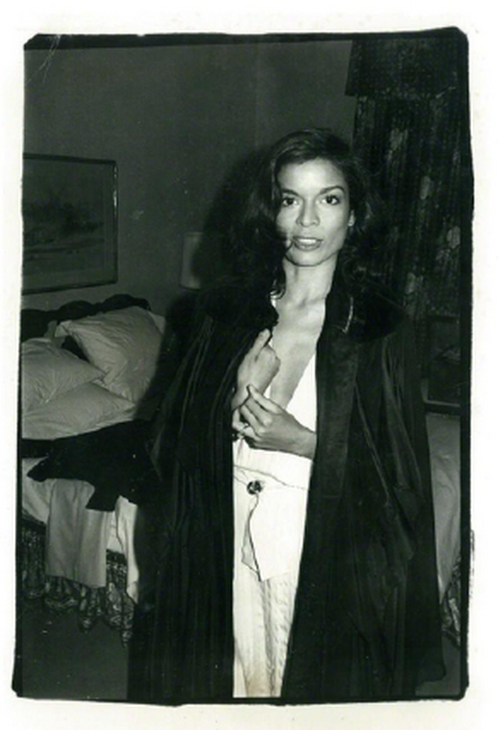 Bianca Jagger in Black Coat in Hotel Room, 1979 (authenticated by the Warhol Estate and Foundation)