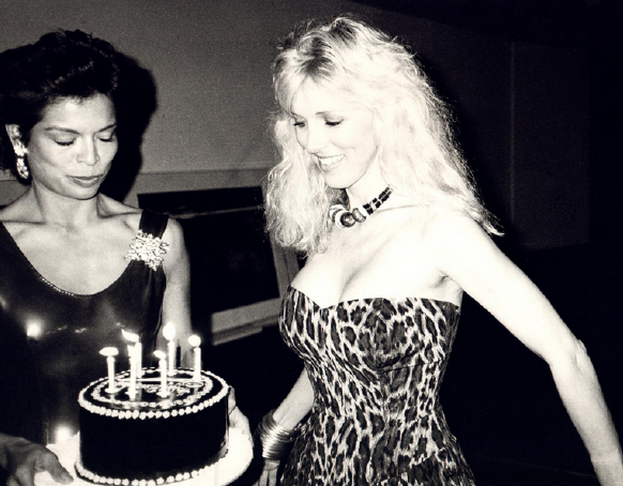 Bianca Jagger with Birthday Cake for Alana Stewart, 1985 (authenticated by the Warhol Estate and Foundation)